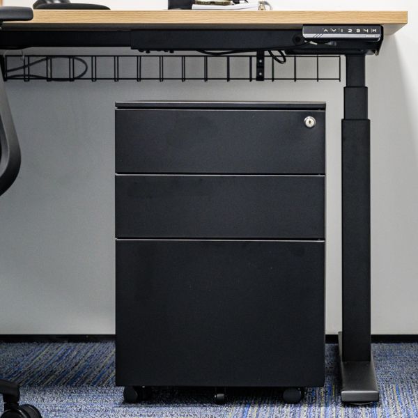 Private office with task chair, desk, and bookshelf storage
