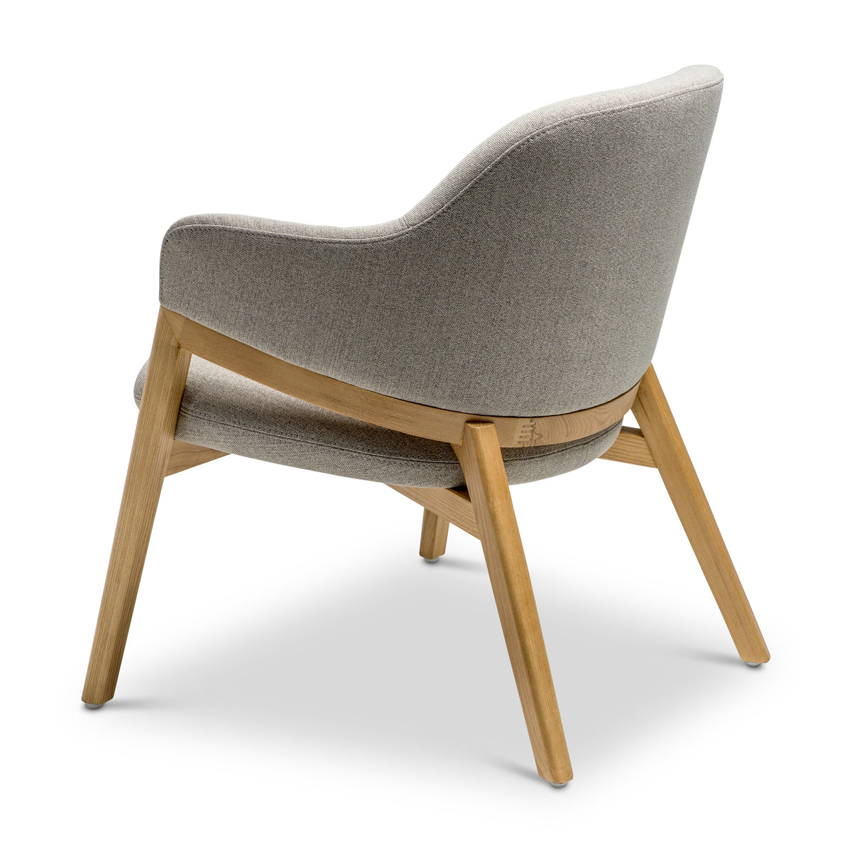 Oatmeal colour armchair with wooden legs, back side of the chair