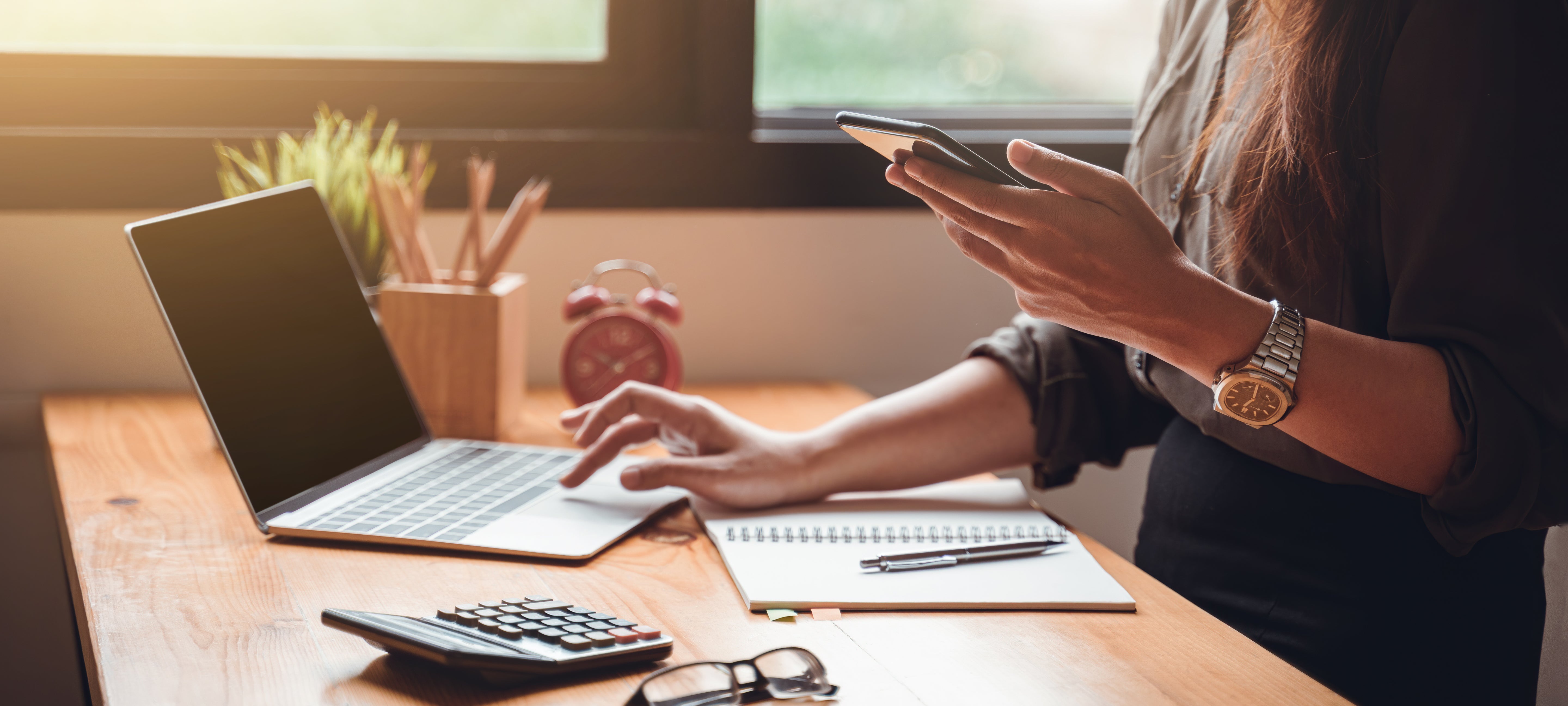 woman using laptop at a desk