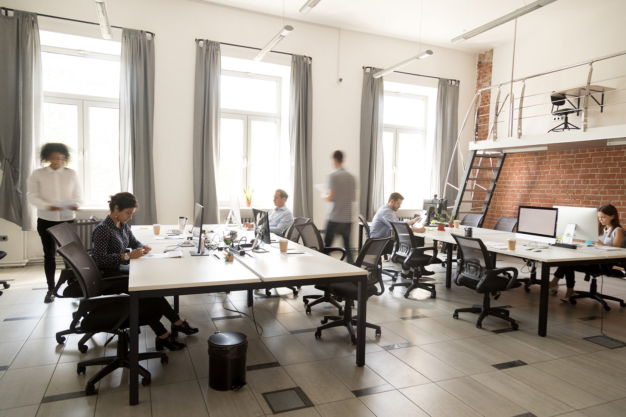 office workers at shared desks