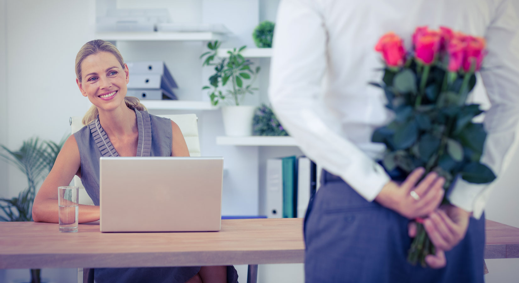 woman in office given flowers