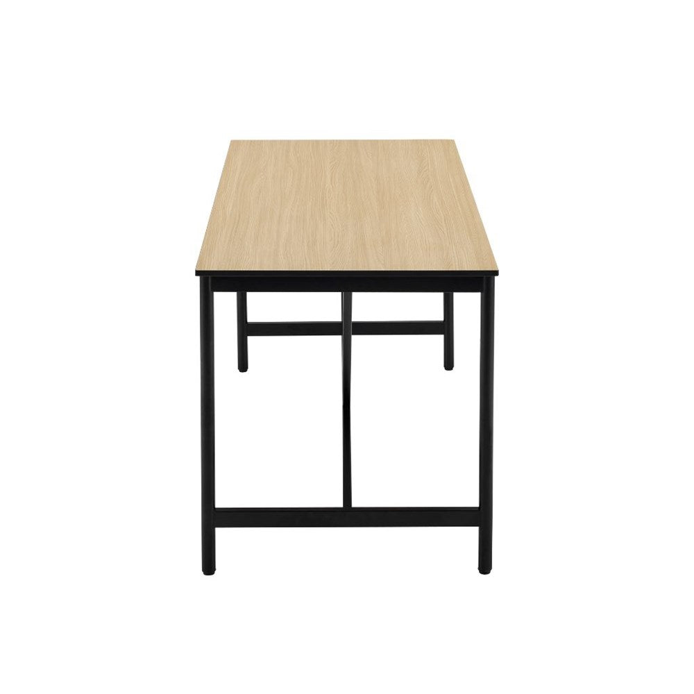 A rectangular desk with a light wood grain tabletop and a black metal frame, shown from a top-down perspective on a solid white background.