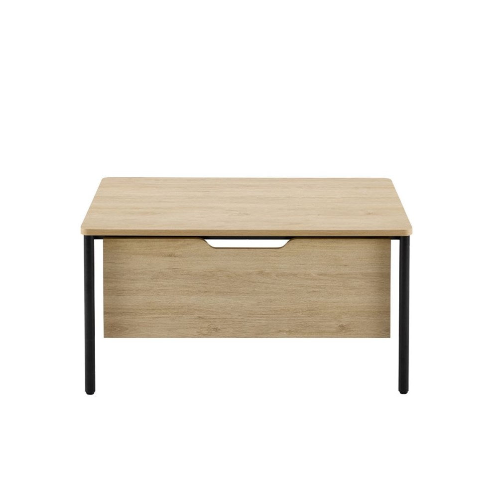 A modern teacher desk with a light oak wood-grain top and front modesty panel, supported by slim black metal legs.