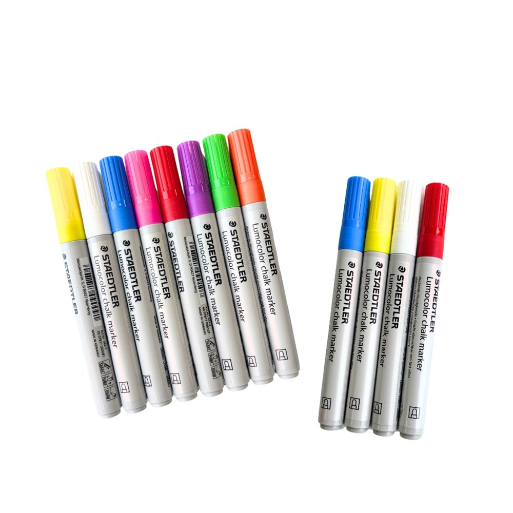 Lumocolor chalk markers in a line with a white background