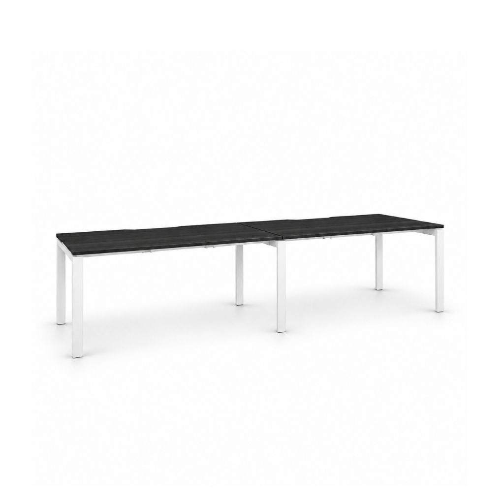 A modern rectangular table with a black top and white metal legs, shown on a plain white background.